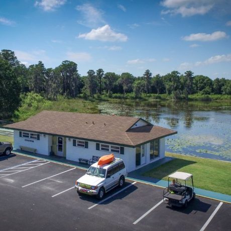 aerial view of building and lake