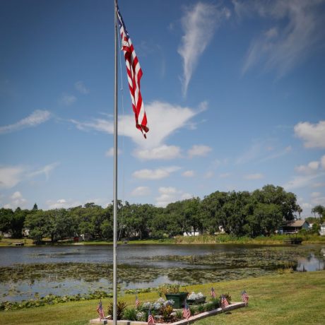 aerial view of lake and American flag